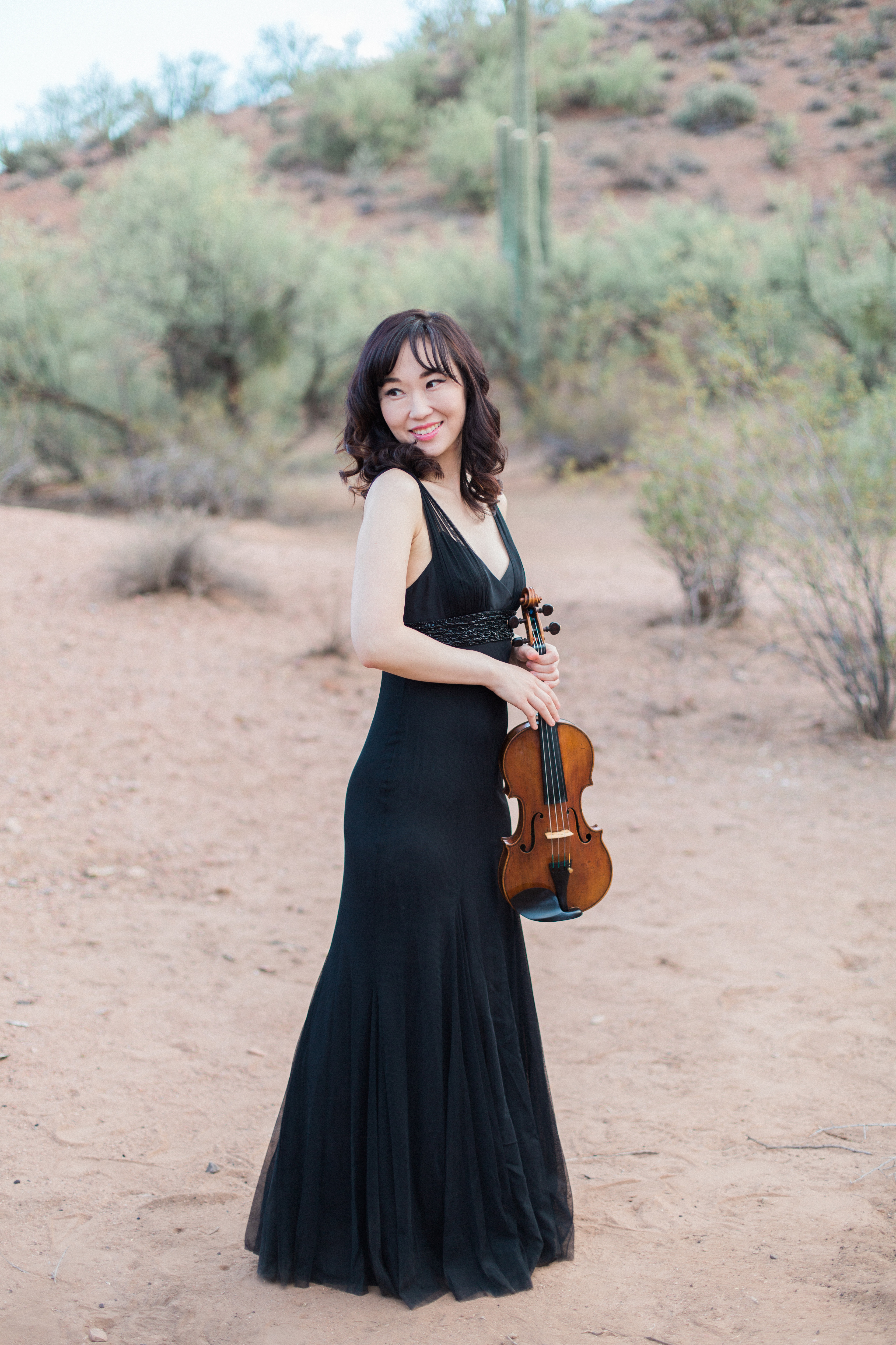 Tricia Park Holding Violin