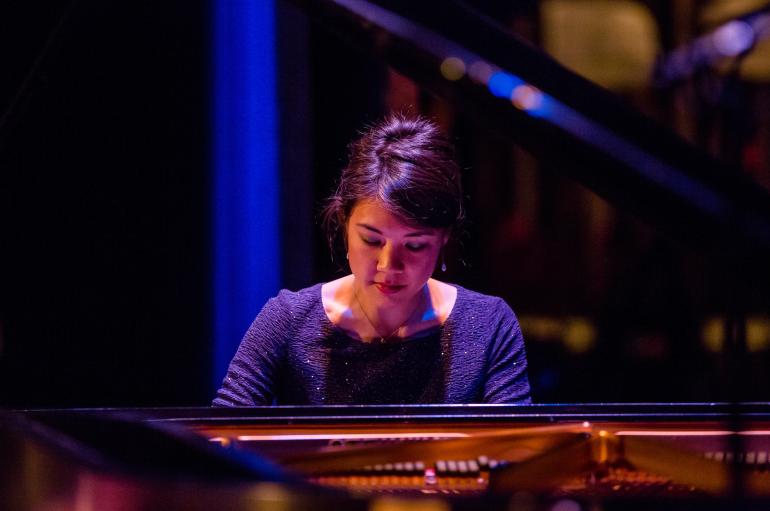 Stephanie Trick seen from inside the piano