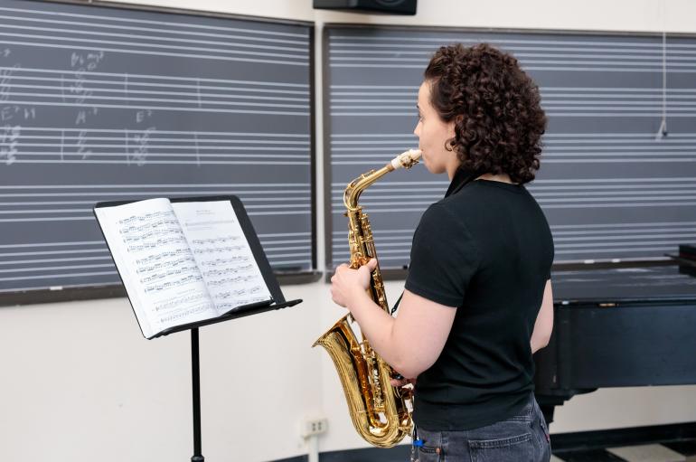Saxophonist rehearsing