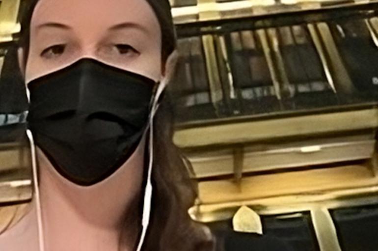 Eva Pensis headshot wearing mask for Covid safety