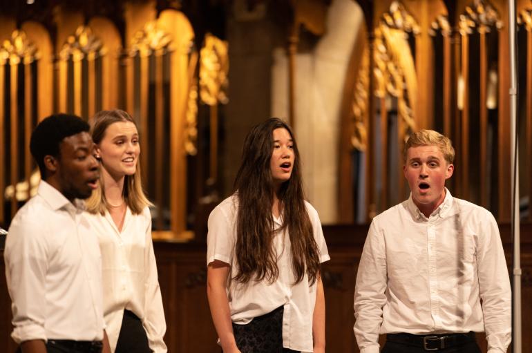 4 singers perform in Rockefeller Chapel