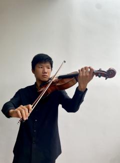 Calvin Dai playing the viola