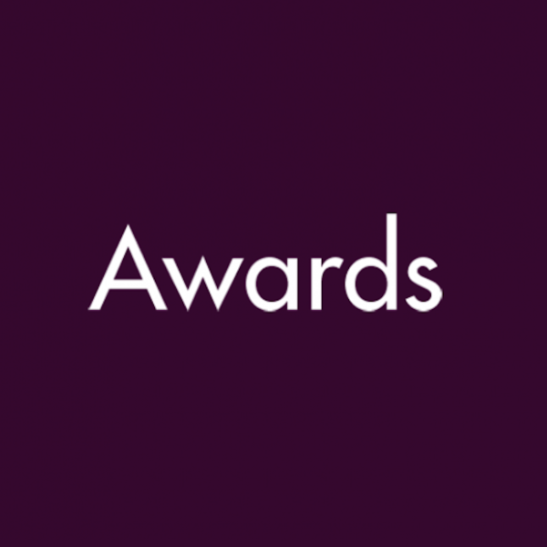 Dark purple background with white text that reads "Awards"